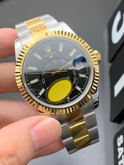 SKY DWELLER GOLD STEEL BLACK DIAL