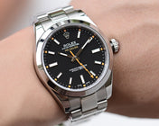 MILGAUSS STAINLESS STEEL BLACK DIAL ORANGE